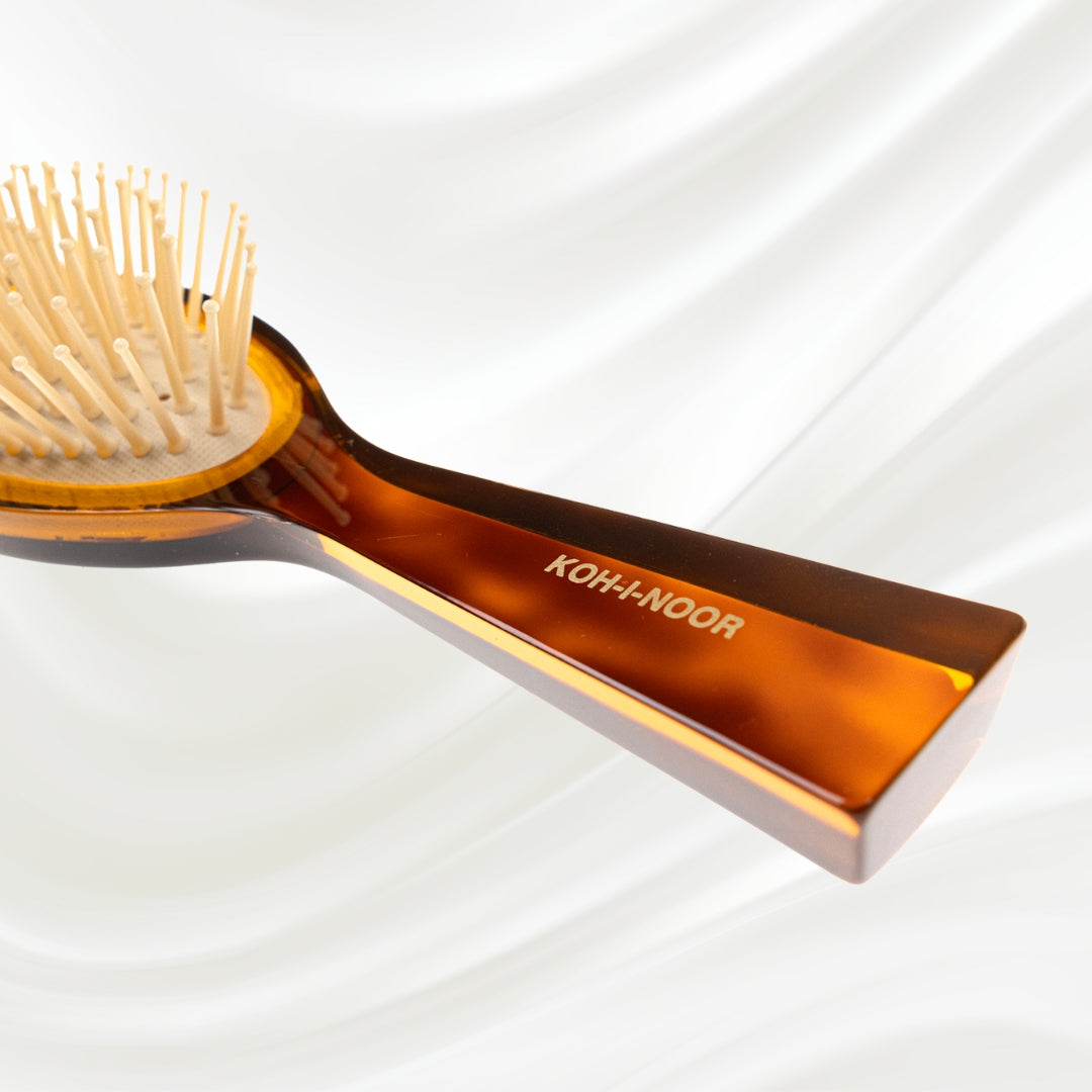 107G KOH-I-NOOR Jaspe small oval hairbrush with brown tortoiseshell acetate handle, and synthetic pins; KOH-I-NOOR's gold logo stamped on the handle