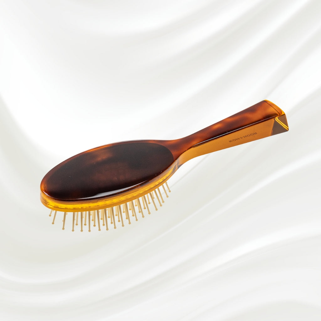 107G KOH-I-NOOR Jaspe small oval hairbrush with brown tortoiseshell acetate handle, and synthetic pins; KOH-I-NOOR's gold logo stamped on the handle