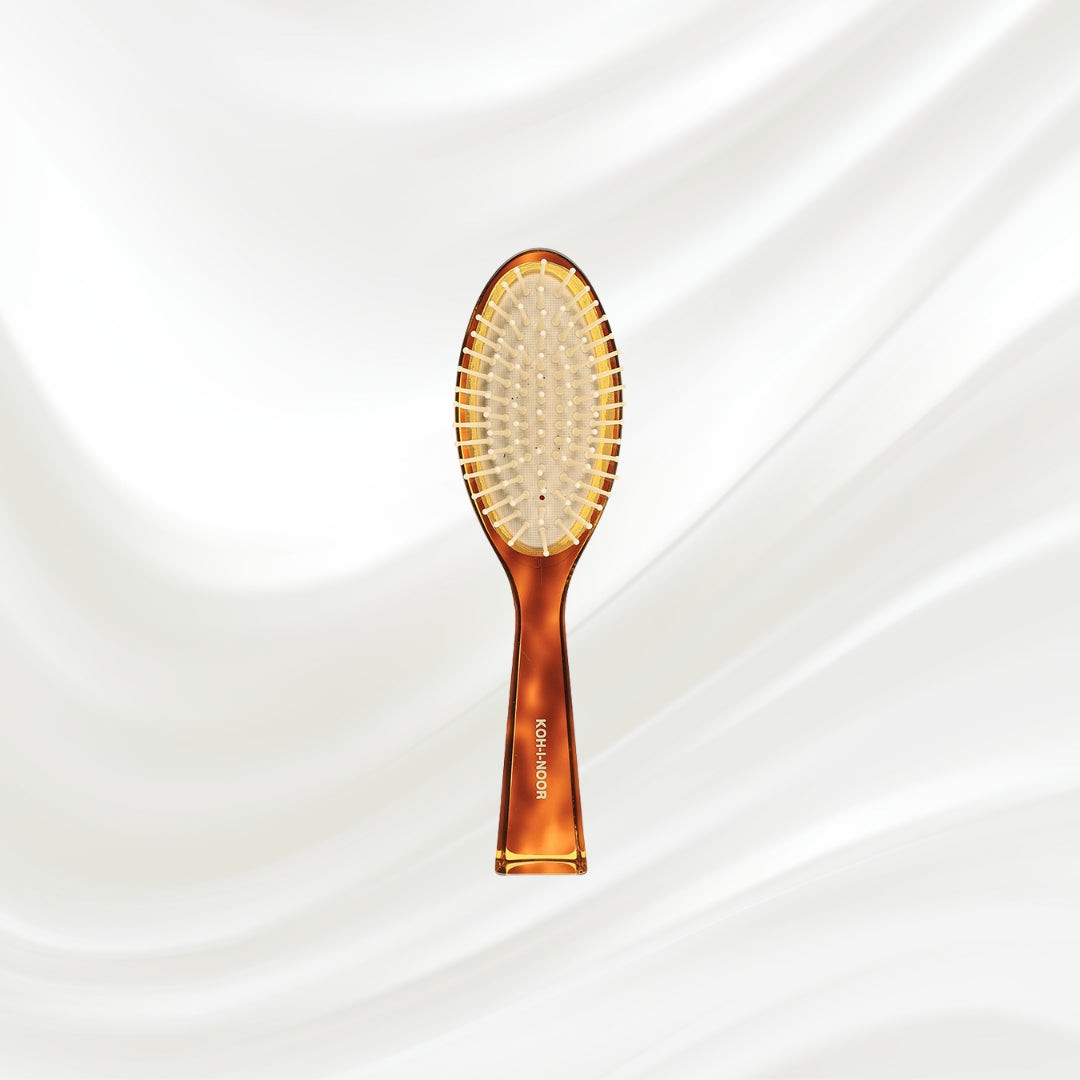 107G KOH-I-NOOR Jaspe small oval hairbrush with brown tortoiseshell acetate handle, and synthetic pins; KOH-I-NOOR's gold logo stamped on the handle