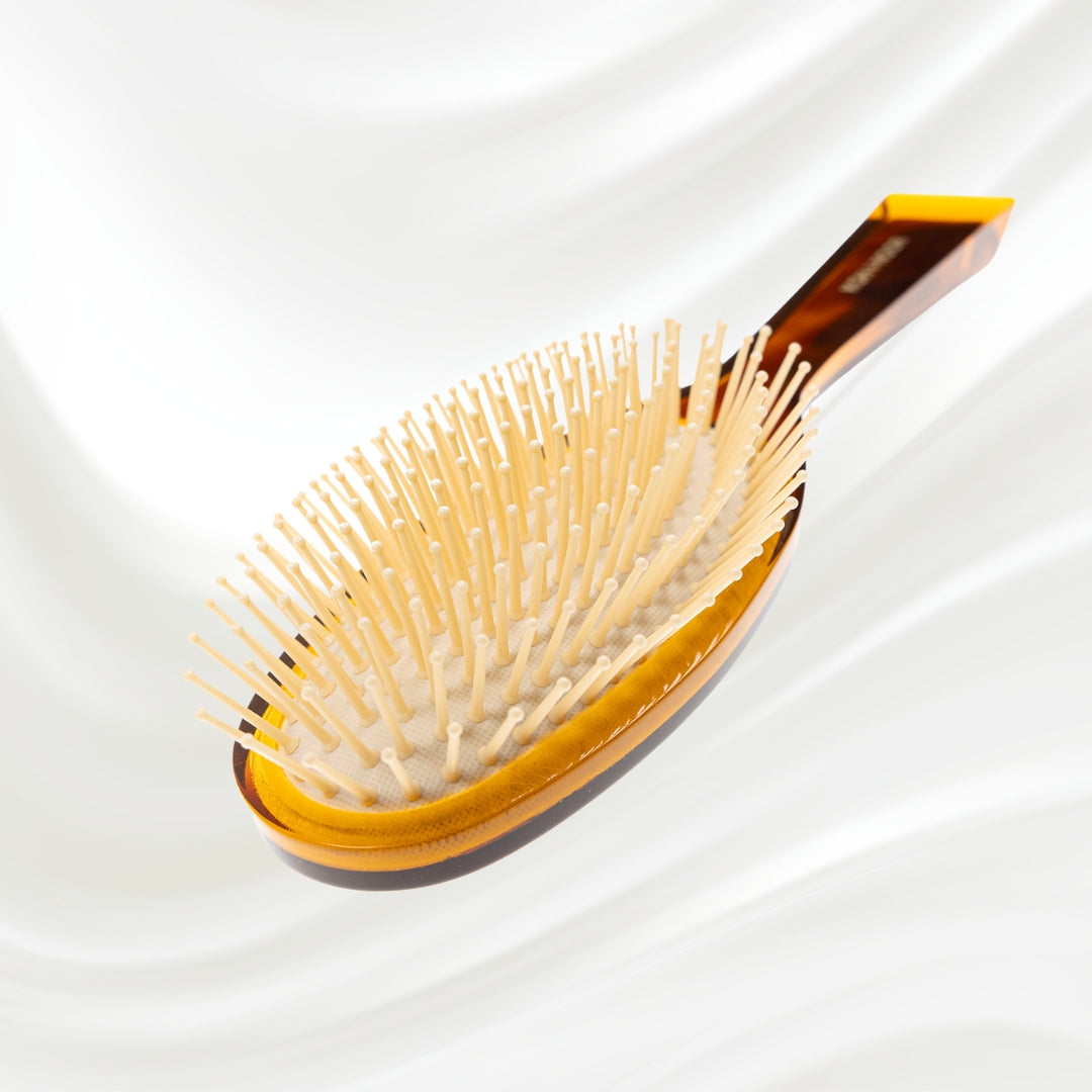 109 KOH-I-NOOR Jaspe large oval hairbrush with brown tortoiseshell acetate handle, and synthetic pins; KOH-I-NOOR's gold logo stamped on the handle
