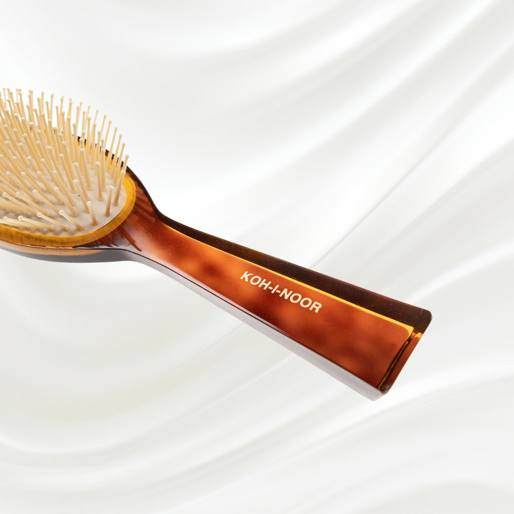 109 KOH-I-NOOR Jaspe large oval hairbrush with brown tortoiseshell acetate handle, and synthetic pins; KOH-I-NOOR's gold logo stamped on the handle