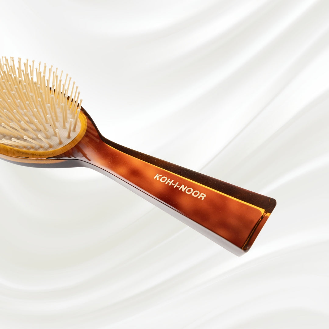 109 KOH-I-NOOR Jaspe large oval hairbrush with brown tortoiseshell acetate handle, and synthetic pins; KOH-I-NOOR's gold logo stamped on the handle