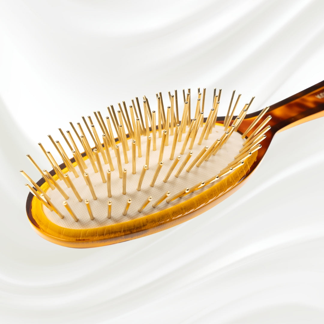 109G KOH-I-NOOR Jaspe small oval hairbrush with brown tortoiseshell acetate handle, and gold pins; KOH-I-NOOR's gold logo stamped on the handle