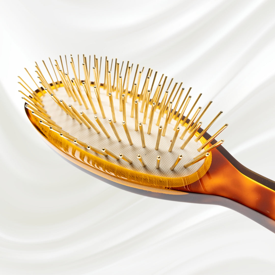 110C KOH-I-NOOR Jaspe large oval hairbrush with brown tortoiseshell acetate handle, and gold pins; KOH-I-NOOR's gold logo stamped on the handle