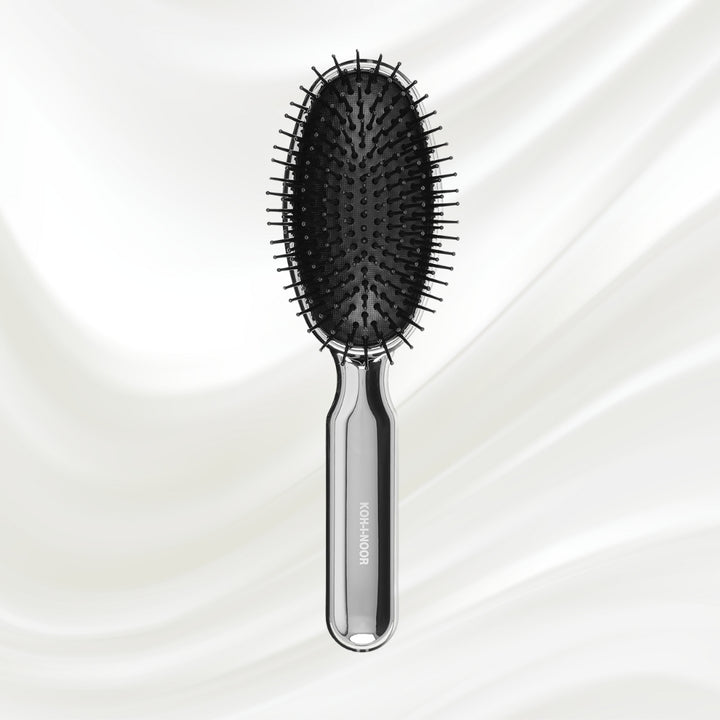 Brosse à cheveux pneumatique métallique ovale à picots synthétiques