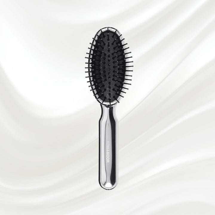 Brosse à cheveux pneumatique métallique ovale à picots synthétiques