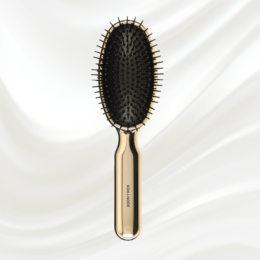 Brosse à cheveux pneumatique métallique ovale à picots synthétiques