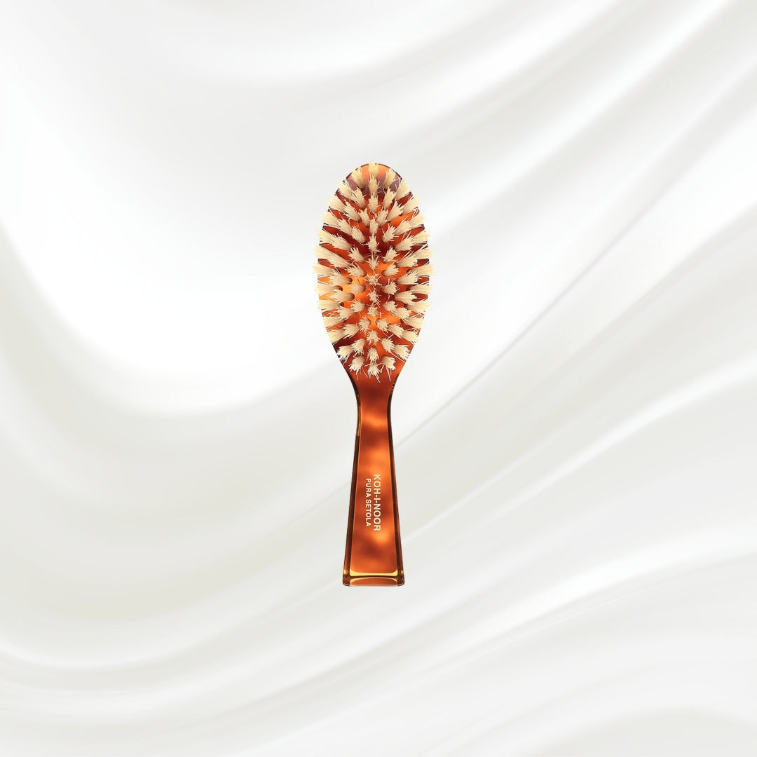 203B KOH-I-NOOR small oval hairbrush with brown tortoiseshell acetate handle and white natural bristles; KOH-I-NOOR's gold logo stamped on the handle