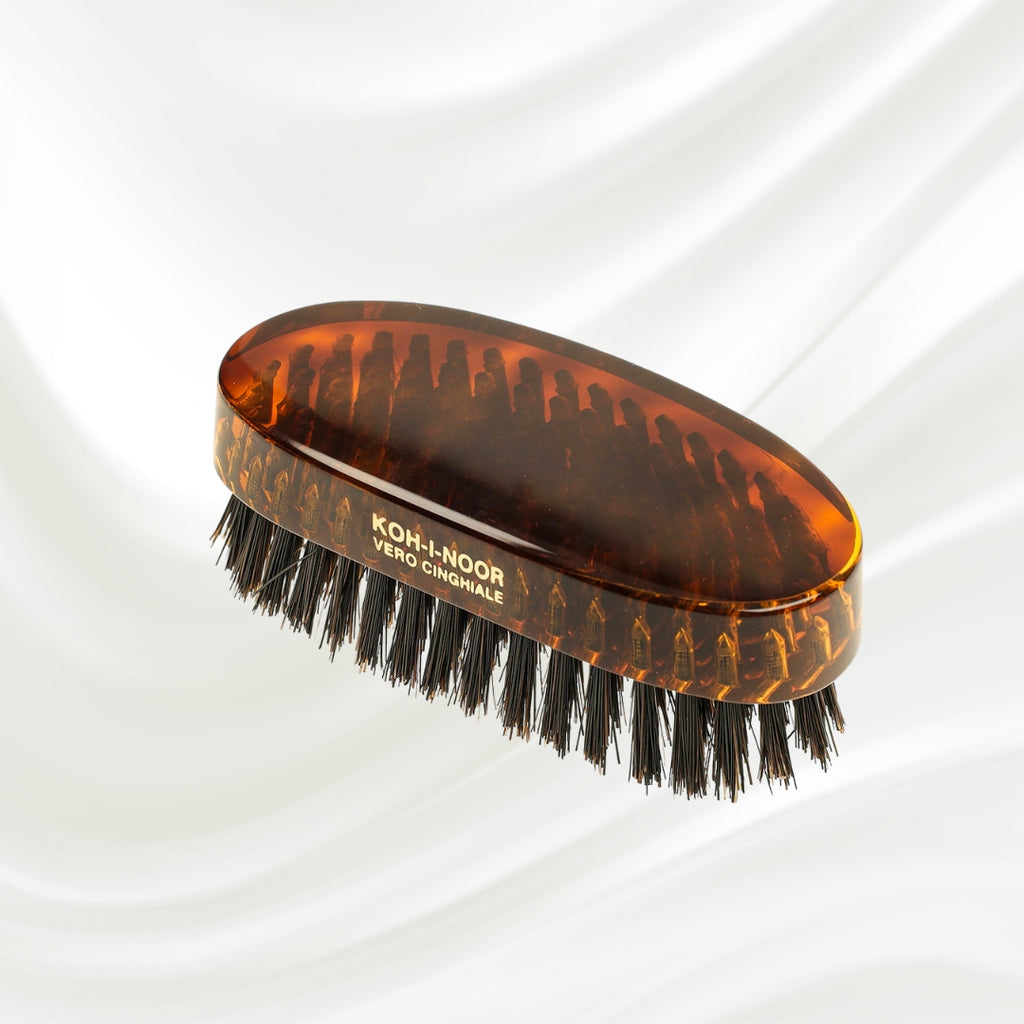 KOH-I-NOOR military hair brush with black boar bristles and brown tortoiseshell acetate handle. Gold KOH-I-NOOR logo on the front