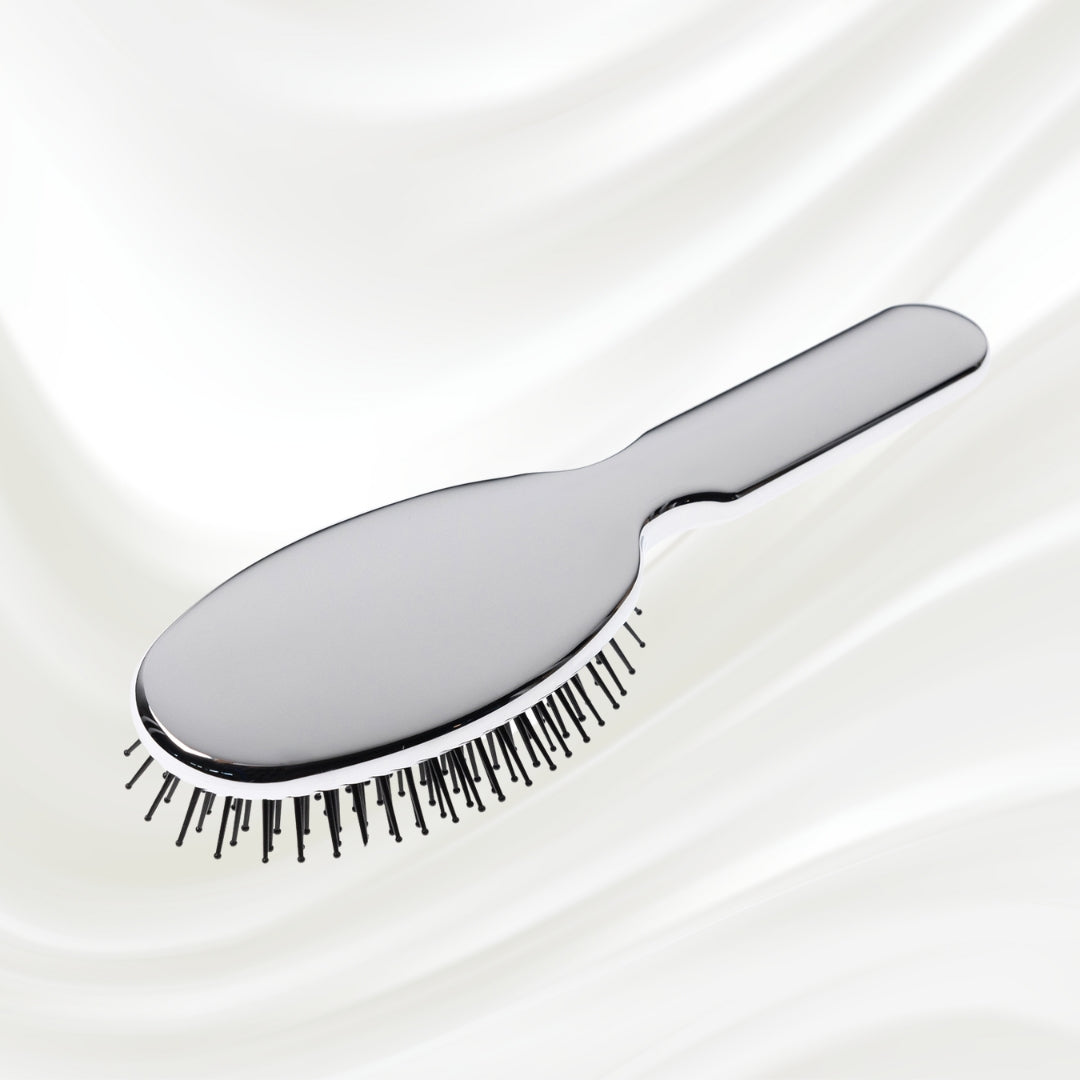 Brosse à cheveux pneumatique métallique ovale à picots synthétiques