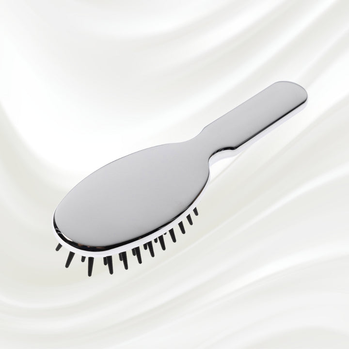 Brosse à cheveux démêlante pneumatique métallique