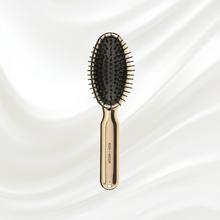 Brosse à cheveux pneumatique métallique ovale à picots synthétiques