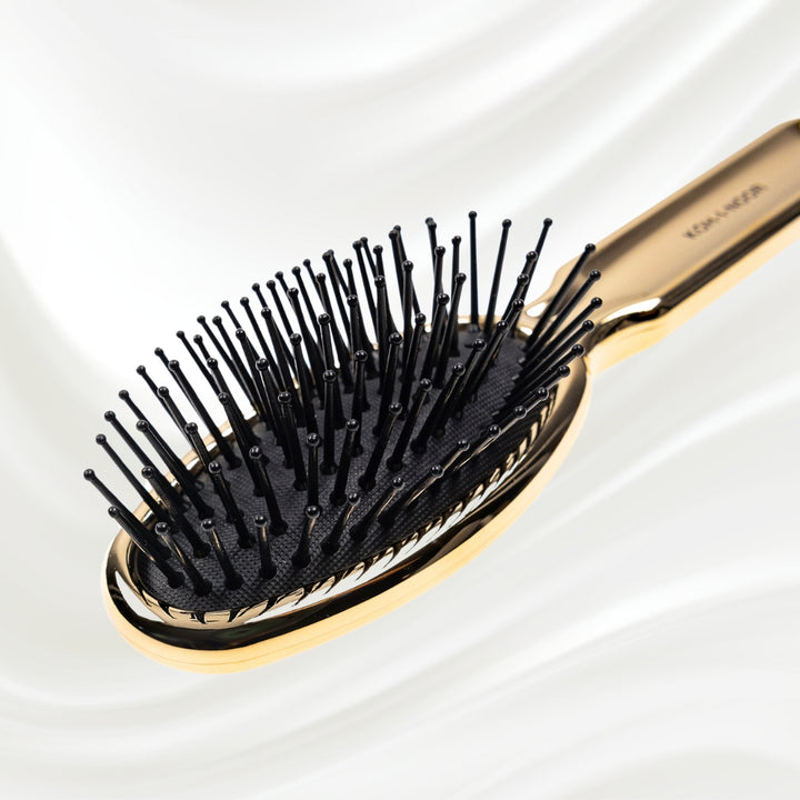 Brosse à cheveux pneumatique métallique ovale à picots synthétiques