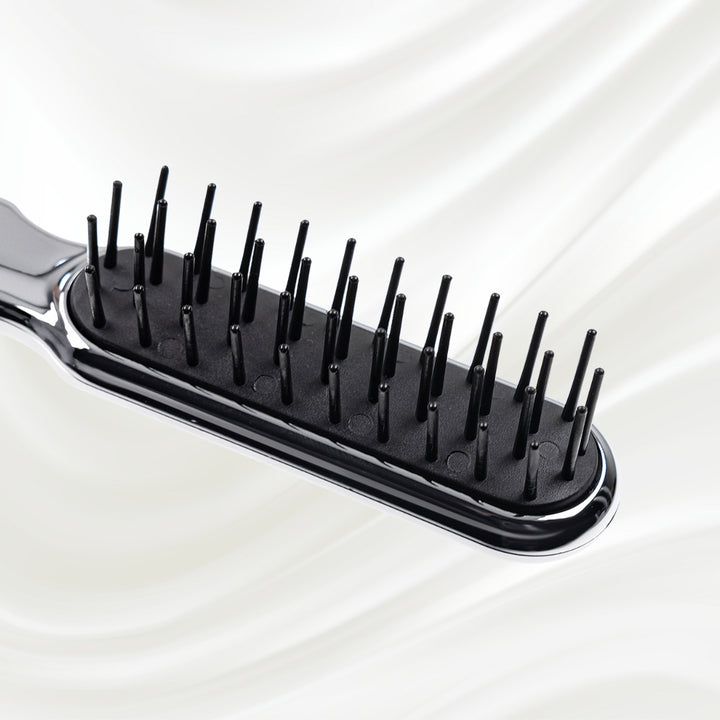 Brosse à cheveux synthétique pneumatique métallique