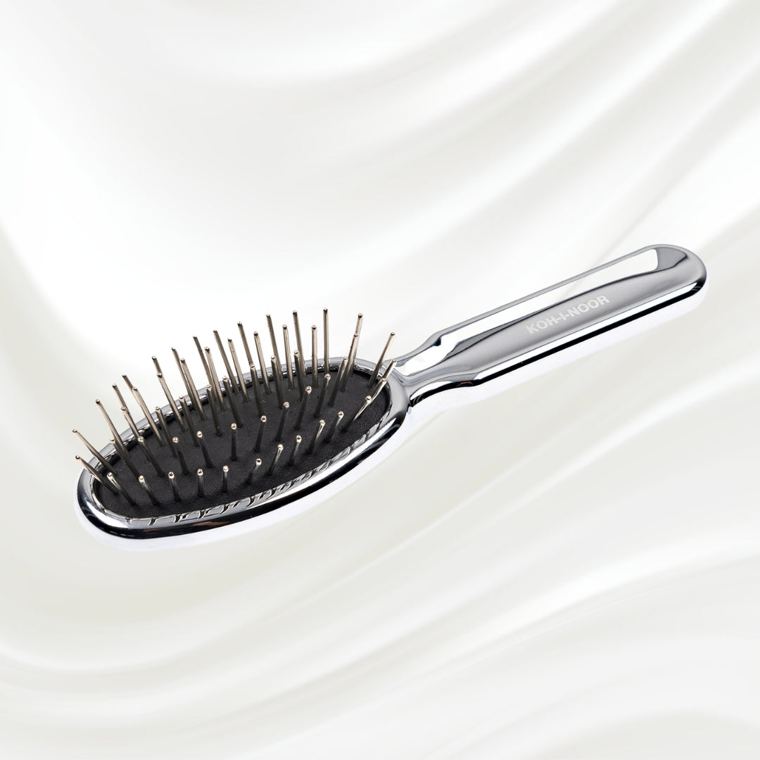 Brosse à cheveux à picots métalliques