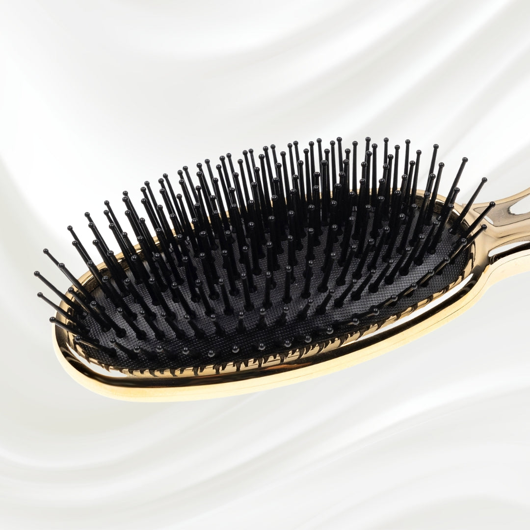 Brosse à cheveux pneumatique métallique ovale à picots synthétiques