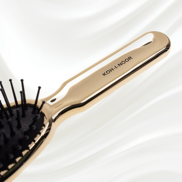 Brosse à cheveux pneumatique métallique ovale à picots synthétiques