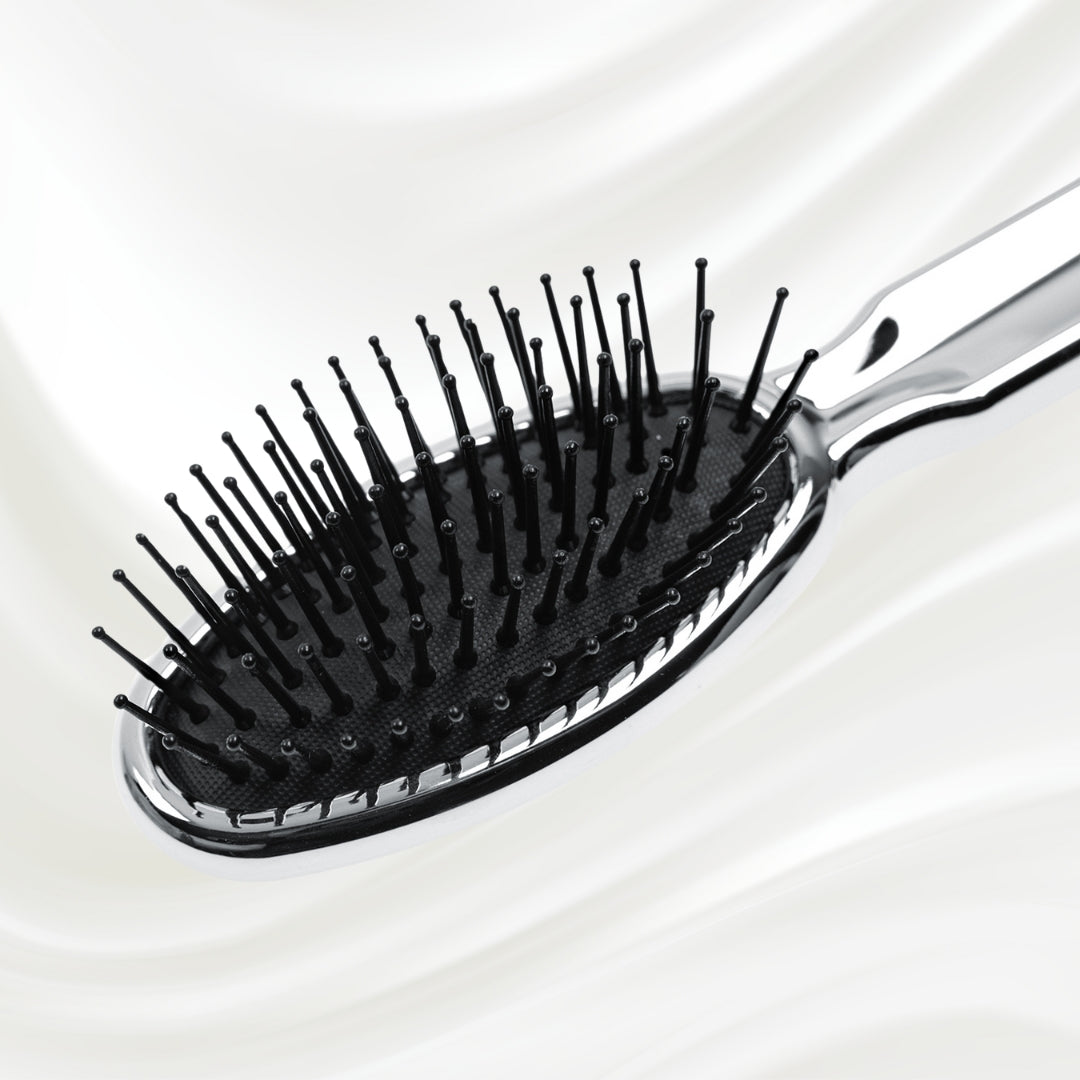 Brosse à cheveux pneumatique métallique ovale à picots synthétiques