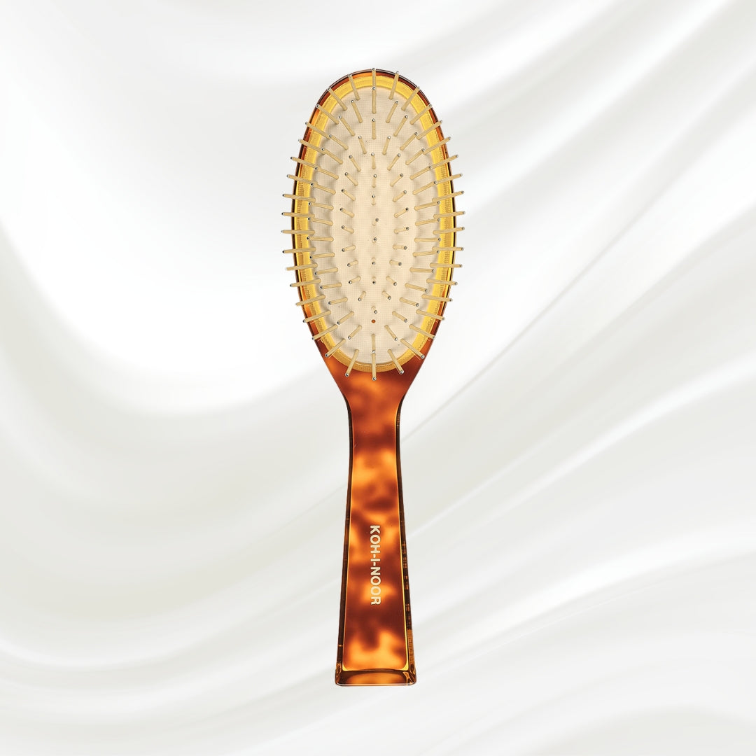 Brosse à cheveux pneumatique Jaspè avec picots en métal plaqué or