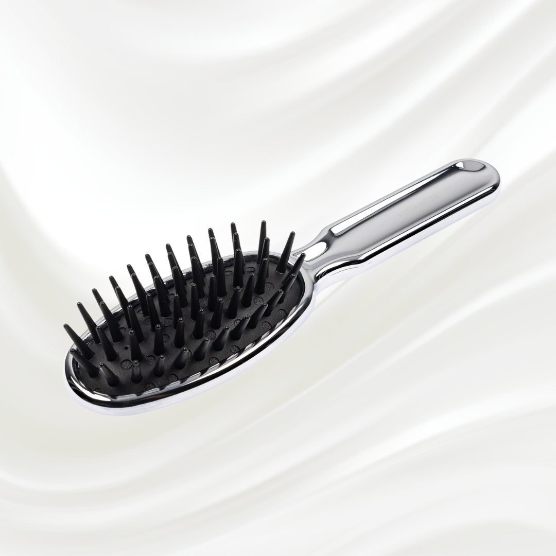 Brosse à cheveux démêlante pneumatique métallique