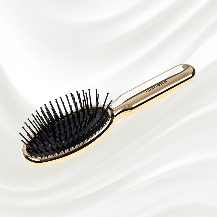 Brosse à cheveux pneumatique métallique ovale à picots synthétiques