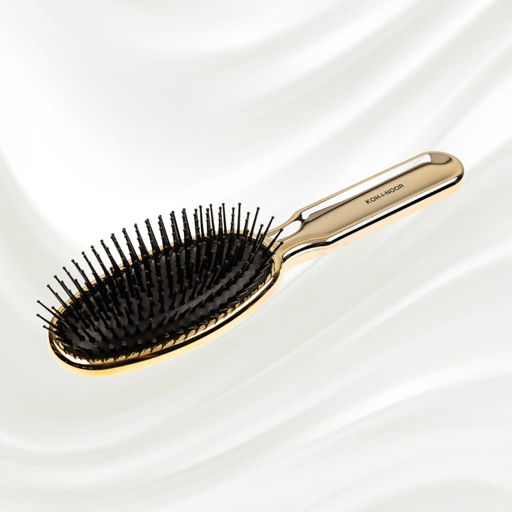 Brosse à cheveux pneumatique métallique ovale à picots synthétiques