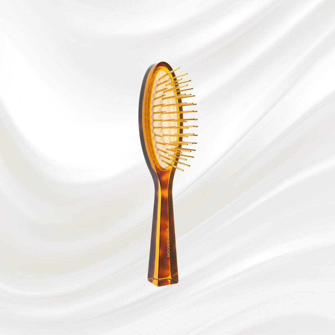 Brosse à cheveux pneumatique Jaspè avec picots en métal plaqué or