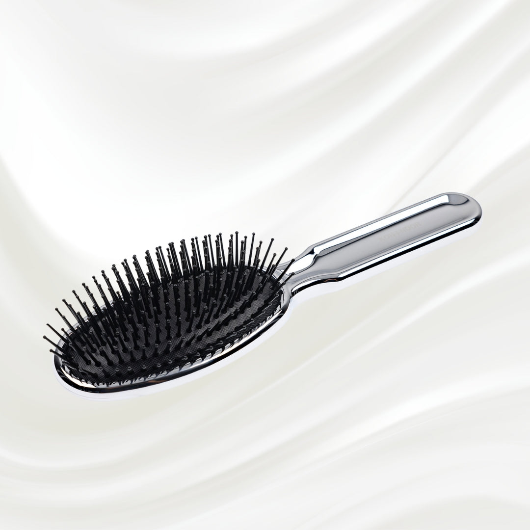 Brosse à cheveux pneumatique métallique ovale à picots synthétiques