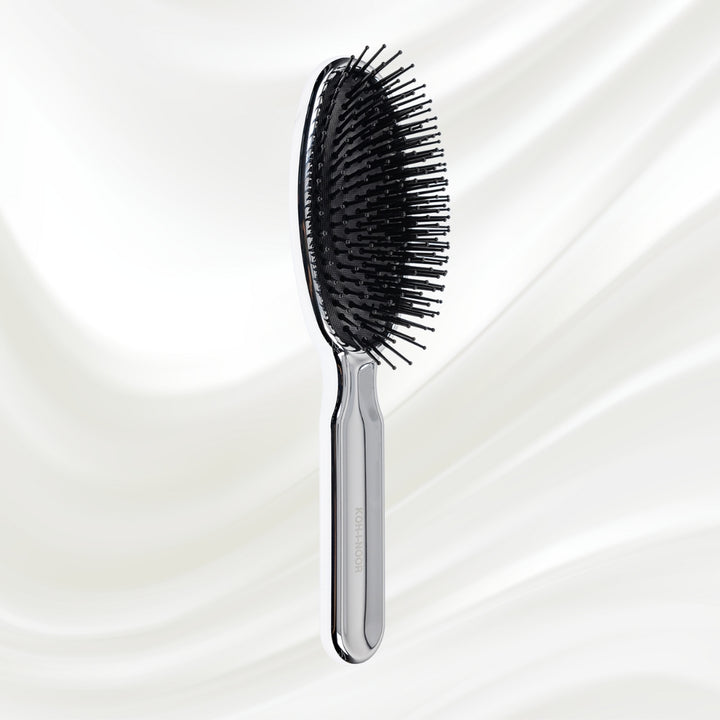 Brosse à cheveux pneumatique métallique ovale à picots synthétiques