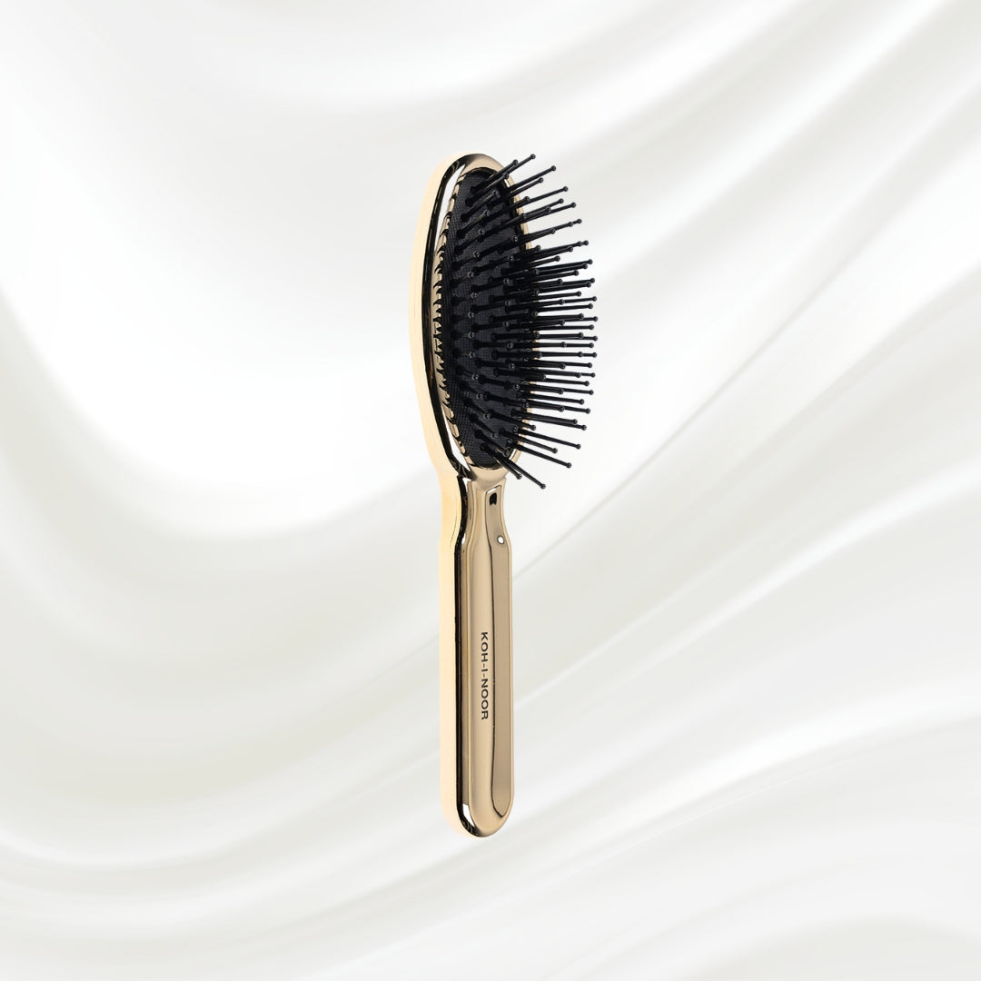 Brosse à cheveux pneumatique métallique ovale à picots synthétiques