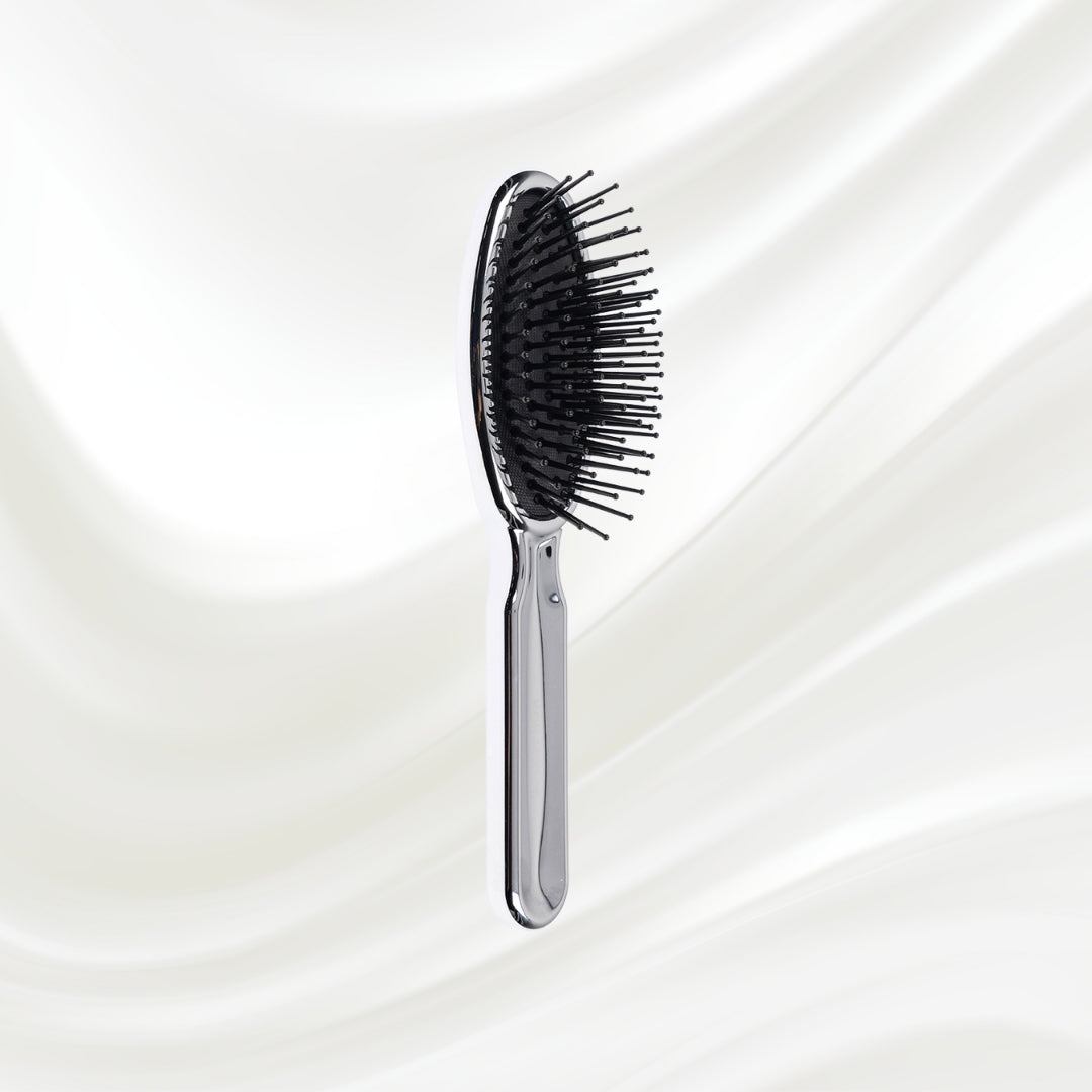 Brosse à cheveux pneumatique métallique ovale à picots synthétiques