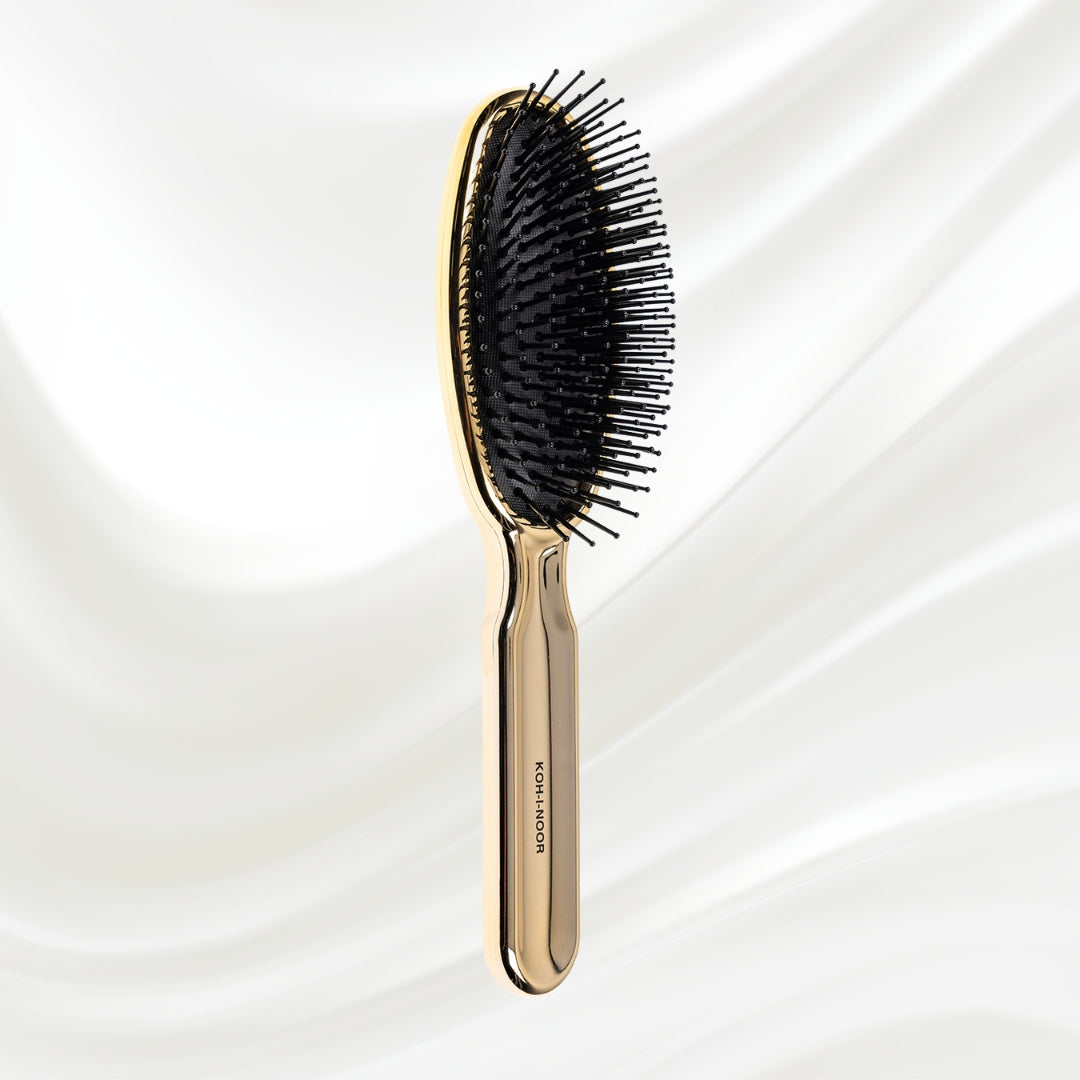 Brosse à cheveux pneumatique métallique ovale à picots synthétiques