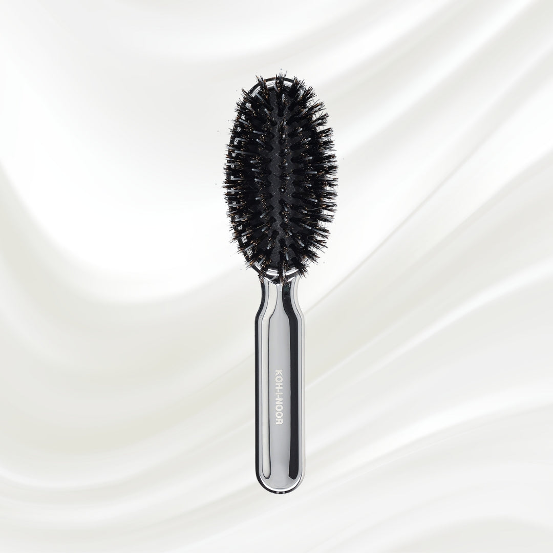 7117KK KOH-I-NOOR Metallic hairbrush with chrome plated handle, and boar and nylon bristles; KOH-I-NOOR's logo stamped on the comb