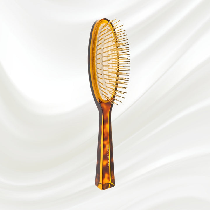 Brosse à cheveux pneumatique Jaspè avec picots en métal plaqué or