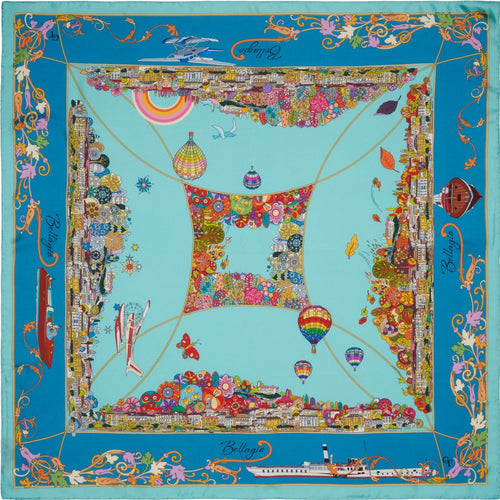 blue silk scarf with four colourful depictions of the town of Bellagio on lake Como during the seasons