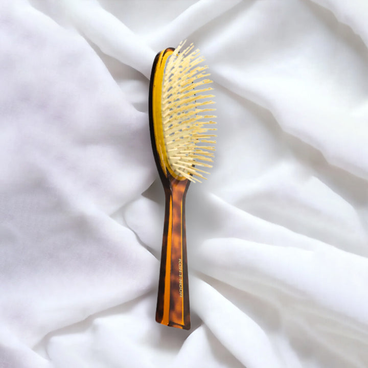 Brosse à cheveux pneumatique ovale Jaspè avec picots synthétiques