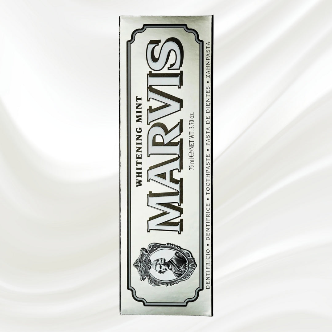 Marvis whitening mint toothpaste tube on a white background