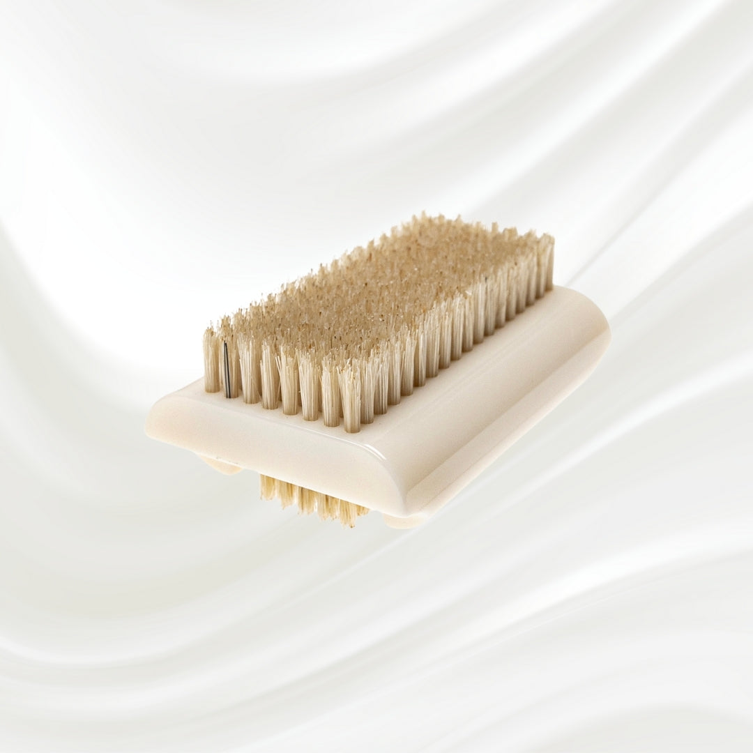 double side white nail brush with natural bristles. KOH-I-NOOR logo printed on the handle